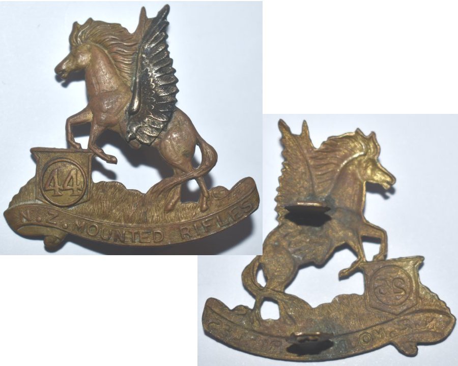 B04/203j. PEGASUS WINGED HORSE cap badge, with  44 in circlet