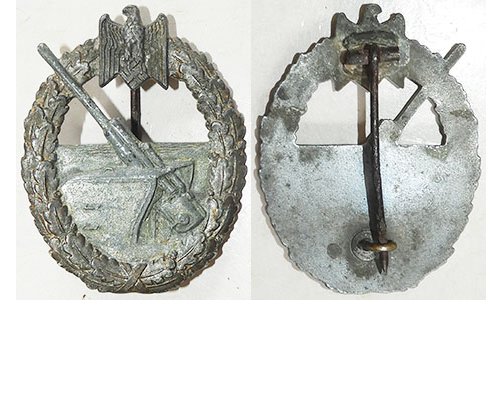 FM0537. GERMAN COASTAL ARTILLERY BADGE, slightly rusted pin