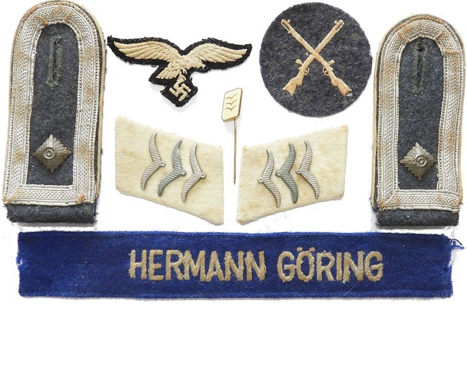GC1450. SET OF HERMANN GORING PANZER REGIMENT INSIGNIA